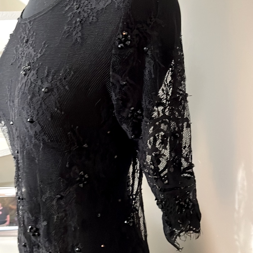 Black lace blouse with a hint of sparkle.  Size Small never worn. Holiday set!
